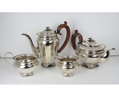 An Elizabeth II silver four piece matched tea set, Barker Ellis Silver Co., Birmingham 1972-73, comprising hot water jug, tea