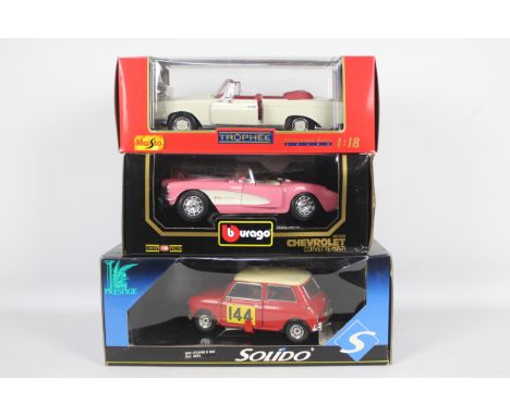 Bburago, Maisto, Solido  - Three boxed 1:18 scale diecast model cars. Lot includes Bburago Chevrolet Corvette (1957) ; Maisto