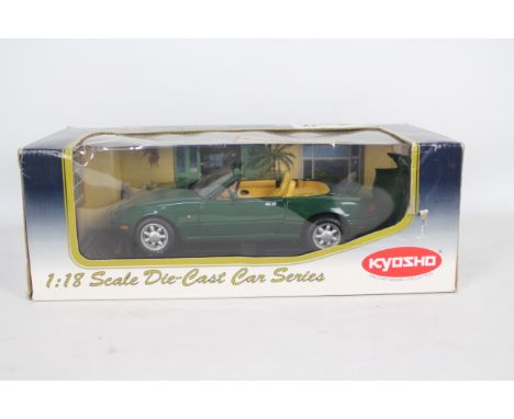 Kyosho - A boxed 1:18 scale Kyosho #08051G Mazda MX-5 Miata. Overall the model appears to be in Very Good condition with sign