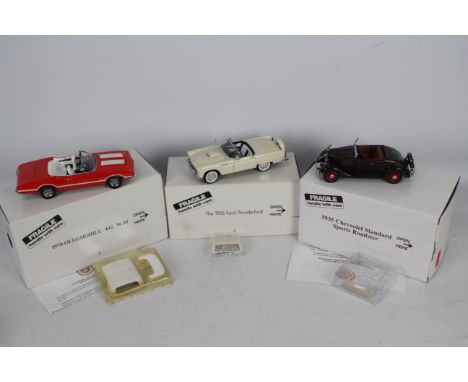 Danbury Mint - Three boxed Danbury mint diecast 1:24 scale vehicles. Lot includes a 1956 Ford Thunderbird; 1970 Oldsmobile 44