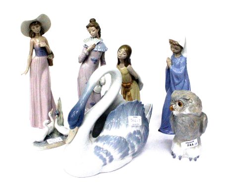 SEVEN PIECES OF NAO LLADRO including four female figures, a group of ducks, an owl and a swan