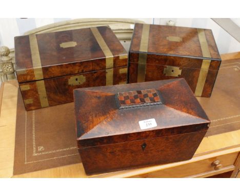 TWO VICTORIAN WRITING SLOPES with brass mounts and a Victorian burr wood sarcoughagus shaped tea caddy with glass sugar jar