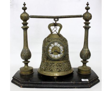 A LATE 19TH / EARLY 20TH CENTURY BRASS MANTLE CLOCK in the form of a bell with a French movement and enamel inset dial, overa