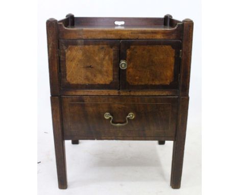 A GEORGIAN MAHOGANY COMMODE with galleried top, cross banded cupboard to the front and commode drawer, 56.5cm wide x 75.5cm h