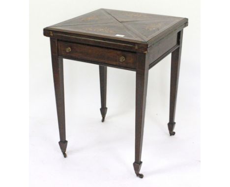 A 19TH CENTURY ROSEWOOD LINE INLAID ENVELOPE CARD TABLE with spade feet terminating brass casters (as found)