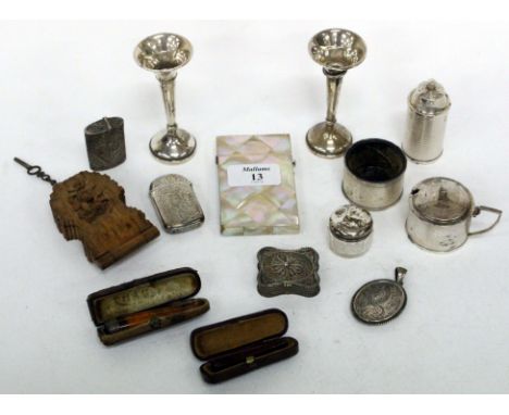 A SMALL GROUP OF MISCELLANEOUS ITEMS to include a mother of pearl and white metal set calling card case, two silver bud vases