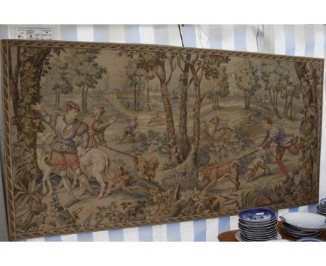 A MACHINE MADE TAPESTRY decorated with a hunting scene, 94cm x 183cm