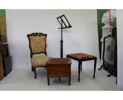 AN EDWARDIAN NURSING CHAIR a late 19th century / early 20th century commode, a mahogany re-upholstered piano stool and a repr