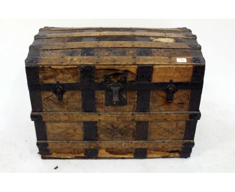 A 19TH CENTURY DOME TOPPED TRUNK with tin mounts and leather handles , 73cm wide