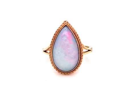 A 9ct GOLD OPAL DOUBLET PEAR CUT CABOCHON RING IN A  RUBOVER BEAD AND ROPE SETTING. FINGER SIZE P, GROSS WEIGHT 3.6grms.