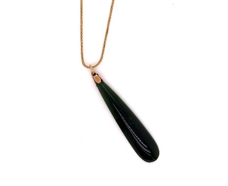 A JADE DROPPER PENDANT ON A 9ct GOLD FOXTAIL CHAIN, CHAIN LENGTH 18", GOLD WEIGHT 2grms, JADE 3.1grms.