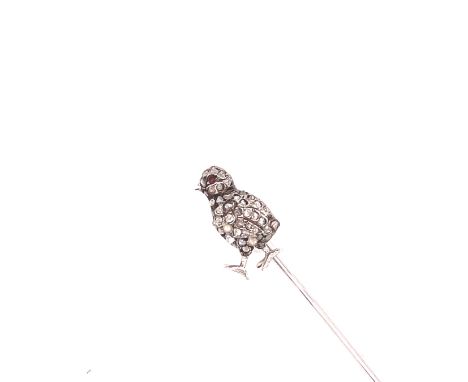 AN ANTIQUE DIAMOND SET STICK PIN. THE CHICK FORM PIN IS PAVE SET WITH OLD CUT DIAMONDS. HEIGHT 14cms. WEIGHT 3grms. CONDITION