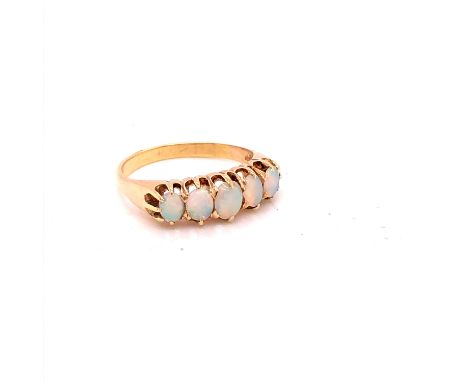 AN 18ct FIVE STONE GRADUATED OPAL CARVED HALF HOOP RING. FINGER SIZE N 1/2. GROSS WEIGHT 4.2grms. 