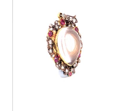 AN ANTIQUE GOLD, ROCK CRYSTAL, DIAMOND AND RUBY MEMORIAL PENDANT CONTAINING A LOCK OF HAIR, WITH A CRYSTAL REVERSE. MEASUREME