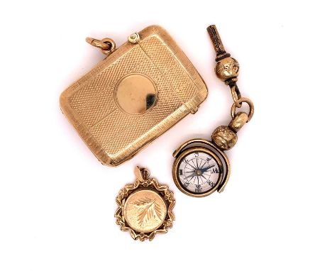 A 9ct GOLD VESTA TOGETHER WITH A SPINNING COMPASS FOB AND WATCH KEY AND A FURTHER 9ct GOLD LOCKET. GROSS WEIGHT 31.4grms. 