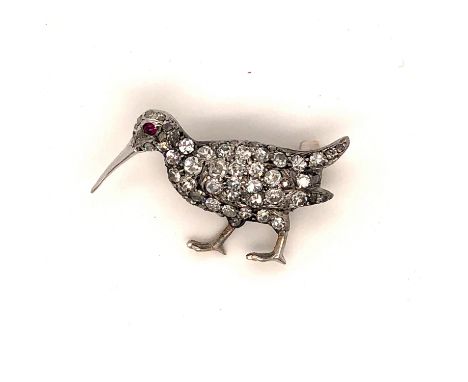 A VICTORIAN PAVE SET DIAMOND WOODCOCK BROOCH WITH A RUBY CABOCHON EYE. MEASUREMENTS 3.1cms x 1.7cms, WEIGHT 5grms.CONDITION:O