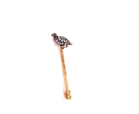 A VICTORIAN DIAMOND SET BIRD BROOCH. THE BODY SET WITH OLD CUT DIAMONDS AND THE HEAD A RUBY EYE, MOUNTED ON A GOLD BROOCH FIT