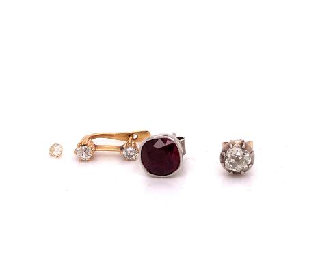 TWO EAR STUDS. A SINGLE OLD CUT DIAMOND APPROXIMATE SPREAD 5mm IN A 19th C. SETTING, AND A CUSHION SHAPE RUBY IN A RUBOVER SE