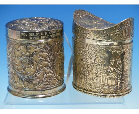 AN ANTIQUE CONTINENTAL SILVER NAVETTE FORM LIDDED CADDY,TOGETHER WITH A MIDDLE EASTERN REPOUSSE DECORATED SILVER BOX. GROSS W