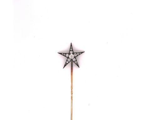 AN ANTIQUE DIAMOND STAR BURST STICK PIN. A CENTRAL OLD CUT DIAMOND RADIATED BY FIFTEEN GRADUATED OLD CUT DIAMONDS. GROSS WEIG