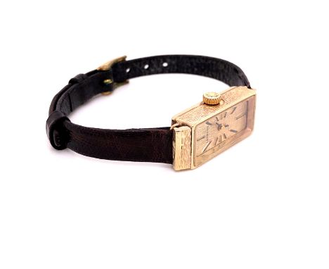 A 9ct GOLD VINTAGE LADIES MANUAL WOUND LONGINES WATCH. GOLD DIAL WITH BATONS, ON A LEATHER HIRSCH STRAP. 