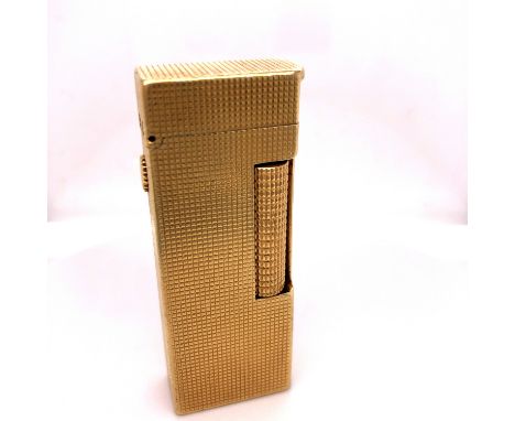 AN 18ct GOLD ROLLAGAS DUNHILL LIGHTER, DATED 1971, WEIGHT 134.6grms.CONDITION:Overall in generally good condition commensurat
