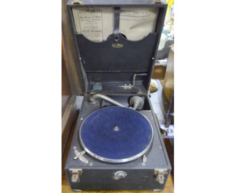 An early 20th C Columbia Grafonola wind up record player a collection of 78 records and a cream bakelite Derwent radio, 1930'