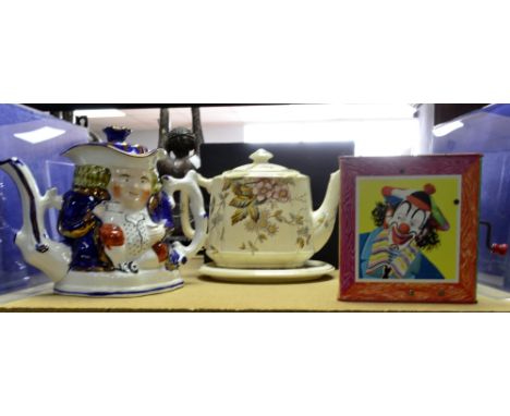 Mr Punch teapot, set of books in case, teapot with stand and a Mattel of California tinplate Jack in the Box 