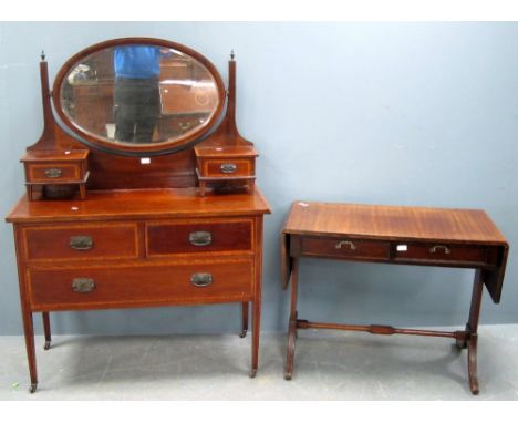 Mahogany dressing table of two short over one long drawer and a mahogany two drawer sofa table on twin end supports 