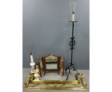 Walnut framed triptych mirror, metal standard lamp, three alabaster table lamps and two brass fire fenders 