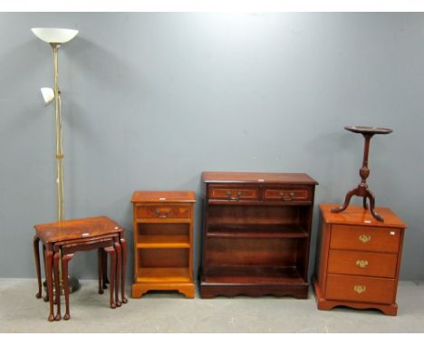 Stag three drawer bedside chest, two reproduction bookcases, mahogany wine table, nest of three drawers and a modern standard