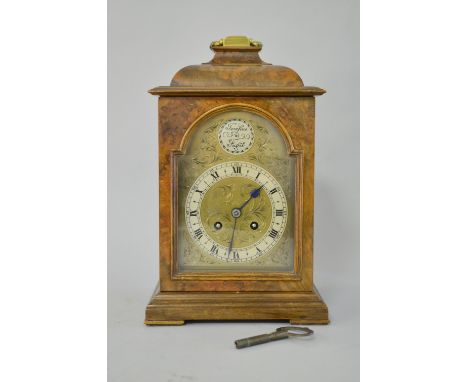 Modern walnut cased twin train mantel clock, 