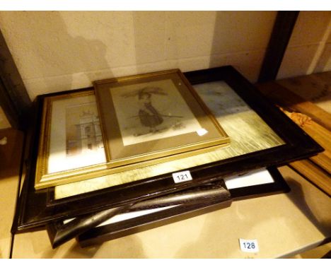 Shelf of mixed pictures and prints