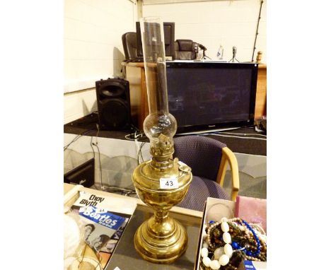 Large brass oil lamp with glass shade