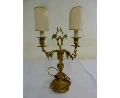 A two branch gilt metal Rococo style table lamp