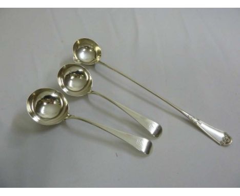 A pair of 18th century silver sauce ladles, Old English pattern and a white metal toddy ladle