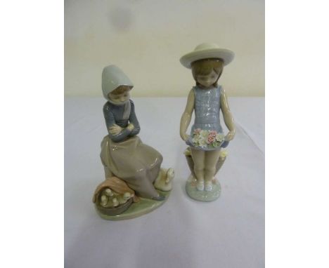 Two Lladro porcelain figurines of girls