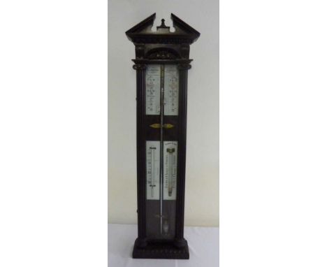 A Casartelli & Co of Liverpool mercury barometer in oak case with swan neck pediment