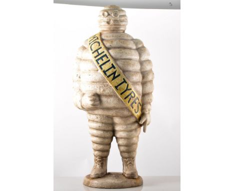 Michelin Tyres: A cast iron showroom display of 'Monsieur Bibendum' (AKA the Michelin Man), in a standing position, with sash