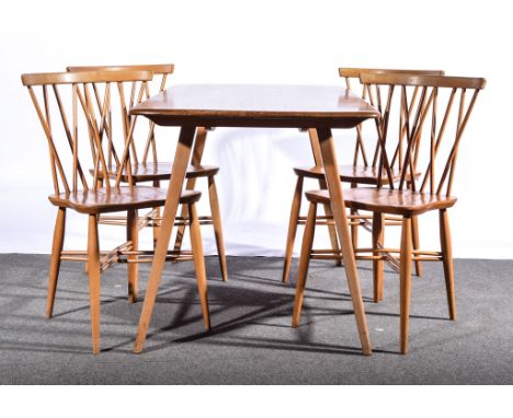 Lucian Ercolani for Ercol,  an elm and beech Windsor dining room suite, comprising a sideboard (shape 328), rectangular dinin