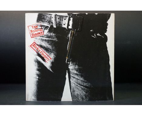 Vinyl - The Rolling Stones Sticky Fingers LP.  French 1971 pressing with zipper cover, comes with insert.  Sleeve has a small