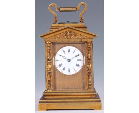 A LARGE LATE 19th CENTURY FRENCH GILT BRASS REPEATING CARRIAGE CLOCK of architectural form with decorative columns to the fro