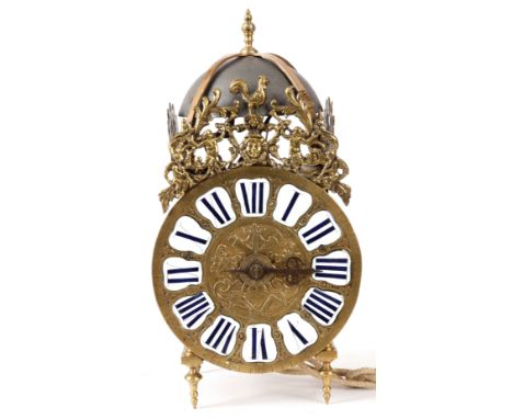 AN EARLY 18th CENTURY FRENCH EIGHT DAY LANTERN CLOCK the brass case of typical form with posted frame and fretwork decoration