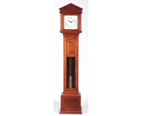 A LATE 20th CENTURY ELECTRIC MAHOGANY LONGCASE CLOCK having an architectural pediment above glazed door flanked by turned col