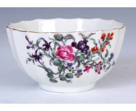 AN UNUSUAL 18TH CENTURY FIRST PERIOD WORCESTER  FLUTED POLYCHROME TEA BOWL with delicate flower spray decoration 8cm diameter