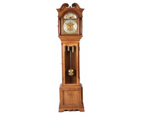 AN EDWARDIAN OAK LONGCASE CLOCK the honey coloured oak case having a swan neck pediment above an arched ogee moulded glazed d