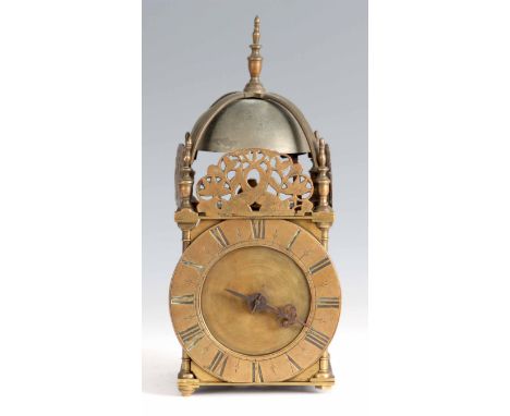 A LATE 17th CENTURY ENGLISH LANTERN CLOCK having a 6" brass engraved Roman chapter ring with zigzag engraved centre below a s