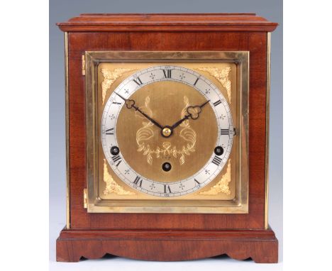 A MID 20th CENTURY WALNUT CASED ELLIOTT QUARTER CHIMING MANTEL CLOCK the square case with moulded top and brass hinged door e