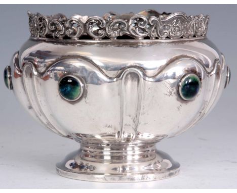 A STYLISH ARTS AND CRAFTS EPBM PEDESTAL BOWL the embossed panelled body set with Ruskin ceramic medallions beneath a pierced 
