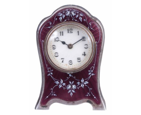 AN EARLY 20th CENTURY MINIATURE SWISS SILVER AND ENAMEL BOUDOIR CLOCK with purple enamel ground over engine turned decoration